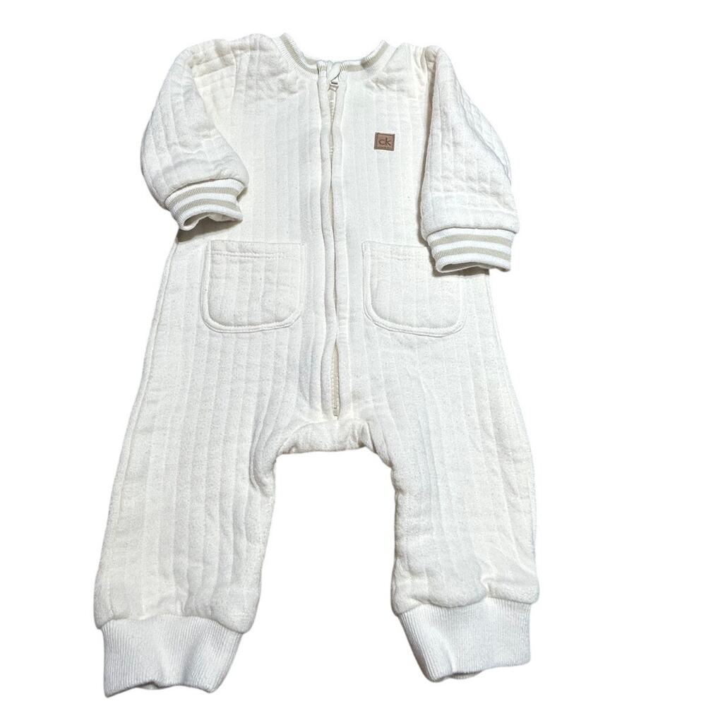 Calvin Klein cream colored coverall w/quilted design and leather ck logo 3/6 mth